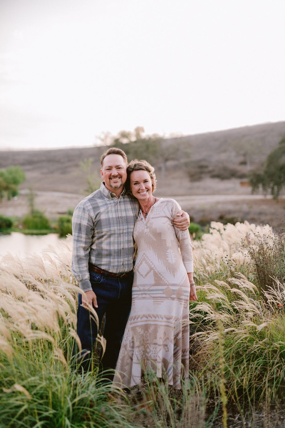 Noah and Codi in the golden hills above the ranch